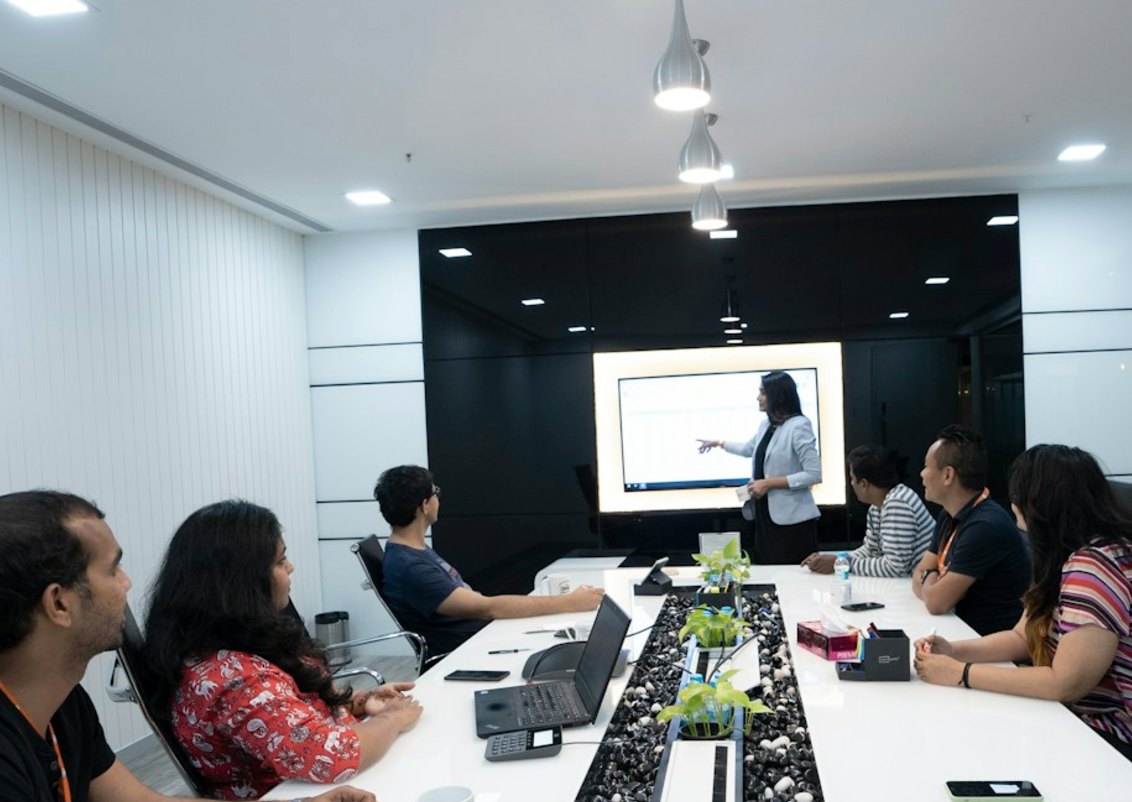 Team review session in a meeting room at the Hyderabad office